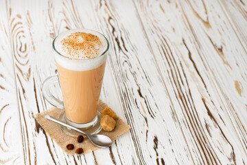 Wall Mural - cup of cappuccino on table