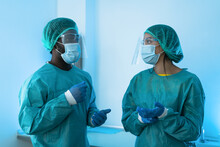 Doctors Wearing Personal Protective Equipment Fighting Against Corona Virus Outbreak - Health Care And Medical Workers Concept
