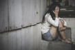 © Tinnakorn - Young depressed woman, domestic violence and rape. stop abusing violence,  human trafficking, stop violence against women, Human is not a product. Stop women abuse, Human rights violations.