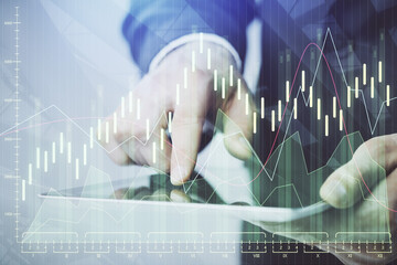 Poster - Multi exposure of man's hands holding and using a phone and financial chart drawing. Market analysis concept.
