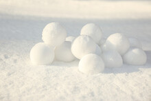 Pile Of Perfect Round Snowballs On Snow Outdoors