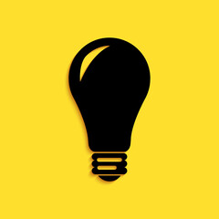 Poster - Black Light bulb icon isolated on yellow background. Energy and idea symbol. Lamp electric. Long shadow style. Vector.