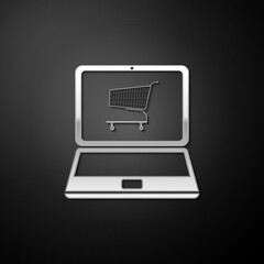Leinwandbilder - Silver Online shopping concept. Shopping cart on screen laptop icon isolated on black background. Concept e-commerce, online business marketing. Long shadow style. Vector.
