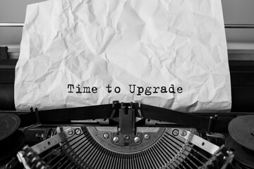 Poster - Text Time to upgrade typed on retro typewriter