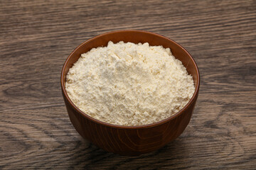 Wheat flour heap in the bowl