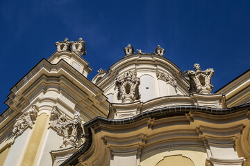 Wall Mural - Architectural fragments of Lviv Greek Catholic Archbishop's Cathedral of Saint George (Ukr: Sobor sviatoho Yura, 1760) - magnificent Rococo ensemble dating back to XVIII century. Lviv, Ukraine.