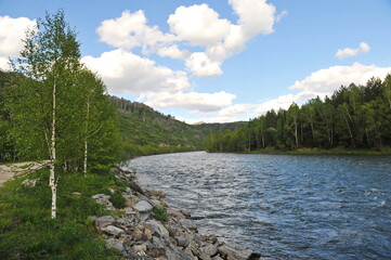  Ridder, Kazakhstan - 06.05.2013 : The Irtysh River, which flows along a mountainous and hilly area with different vegetation.