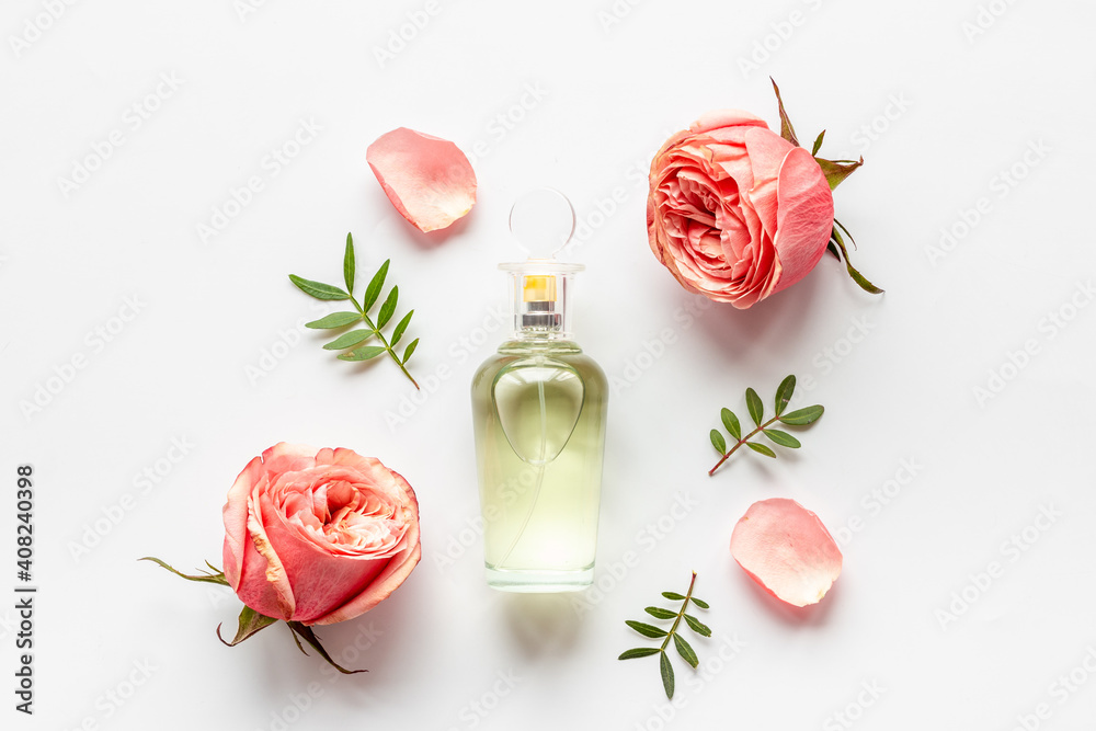 Floral flat lay with perfume bottle, top view - obrazy, fototapety, plakaty 