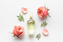 Floral Flat Lay With Perfume Bottle, Top View