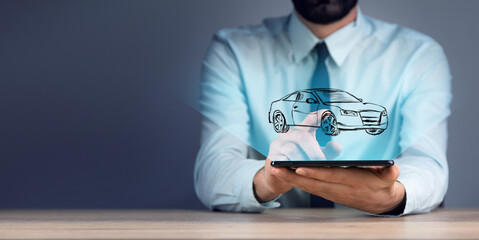 Wall Mural - man holding tablet with car model