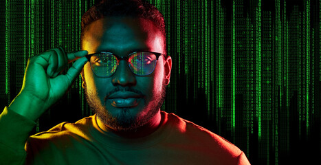 technology, cyberspace and programming concept - portrait of young african american man over binary 