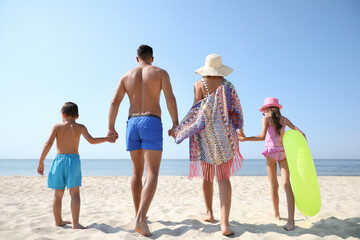 Sticker - Family at beach on sunny summer day