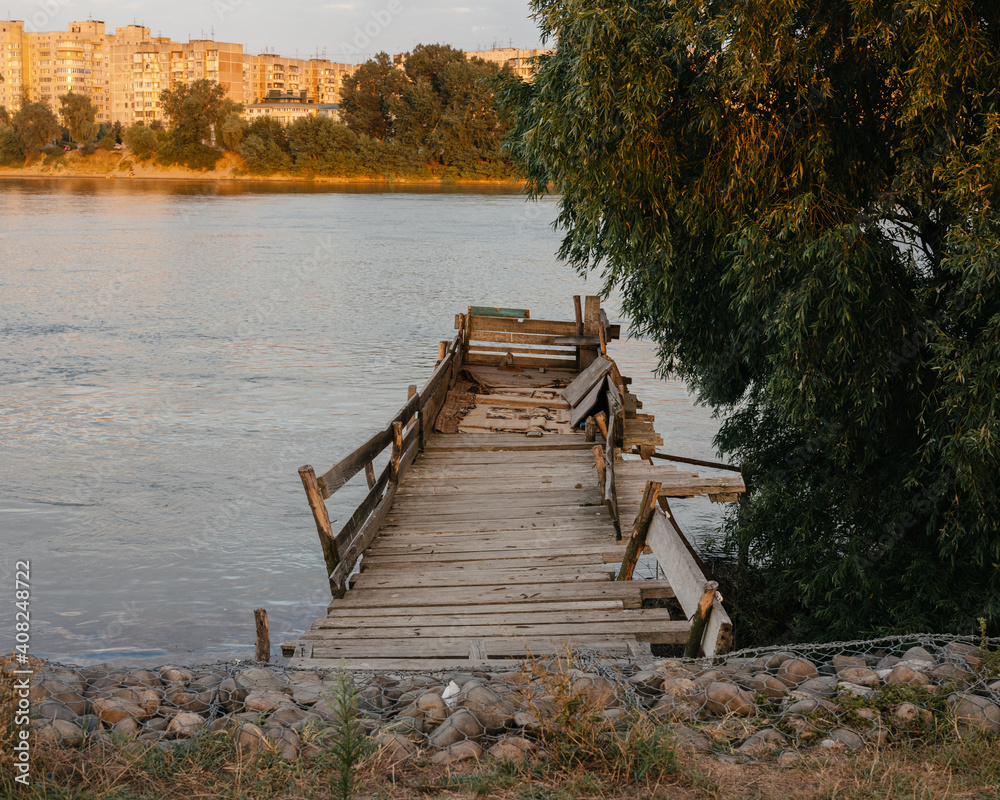 Destroyed wooden bridge and river stones nature fresh air - obrazy, fototapety, plakaty 