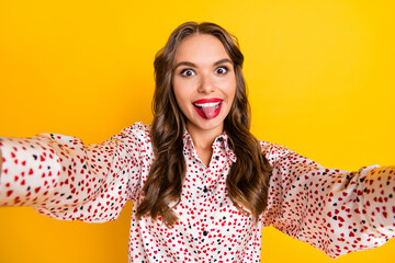 Sticker - Photo of nice person take selfie tongue out have fun wear heart print clothing isolated on yellow color background