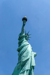 Looking at the symbol of New York, the Statue of Liberty