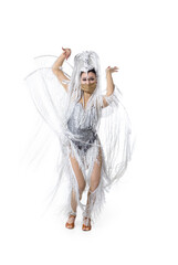 Wall Mural - Flexible. Beautiful young woman in carnival, stylish masquerade costume with feathers and golden face mask on white background. Concept of holidays celebration, festive time, dance, party, fashion