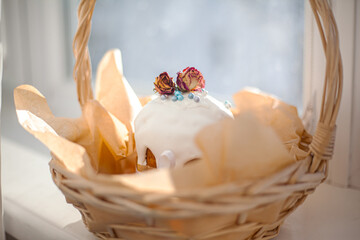 Wall Mural - Traditional russian easter cake on table. The decorarion of kulich are the flower are eating on spring holiday