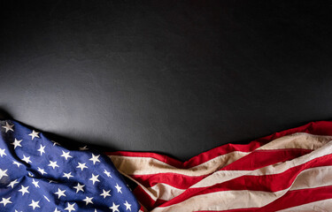 Wall Mural - Happy presidents day concept with flag of the United States on black wooden background.