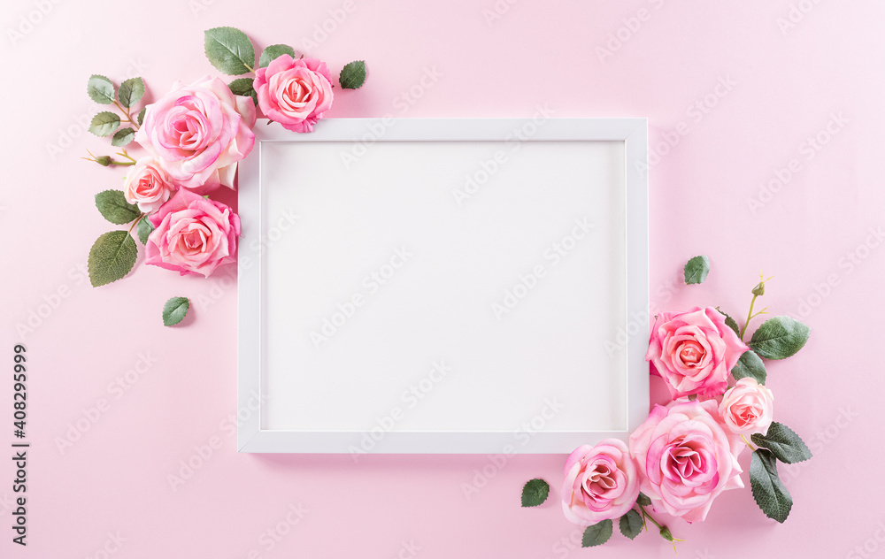 Happy women's day concept, pink roses with white picture frame on pastel background - obrazy, fototapety, plakaty 