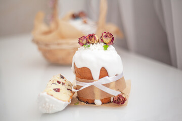 Wall Mural - Traditional Russian easter bread on table. The decorarion of kulich are the flower are eating on spring holiday