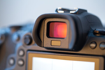 Sticker - Close up viewfinder of a professional digital camera.