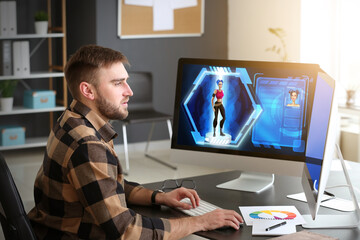 Poster - Male video games designer working in studio