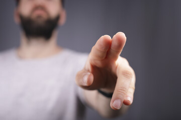 Poster - young man finger pointing touch