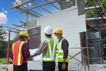 Wall Mural - Roofer Construction worker install new roof,Roofing tools,Electric drill used on new roofs with Metal Sheet.