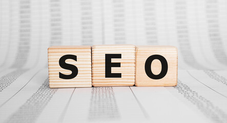 Poster - word seo made with wood building blocks, business concept.