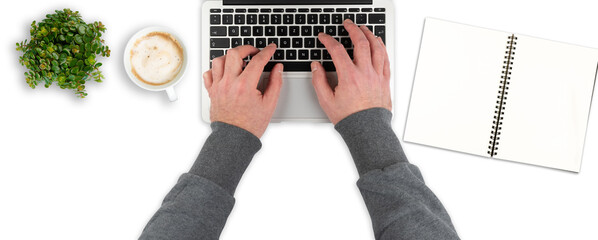 Wall Mural - overhead view of clean white office desk with person typing on laptop computer, working from home template