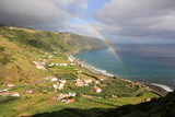 Fototapeta Tęcza - Santa Maria island, landscape with rainbow, small village, mountains, bay, Azores.