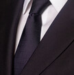 Close up of business suit and tie