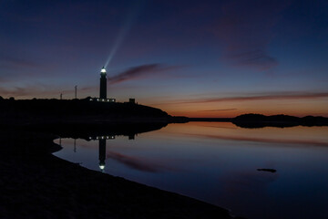 Sticker - the Cape Trafalgar lighthouse signal light after sunset with colorful evening sky