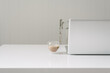 © Gillian Vann/Austockphoto - clean white desk with laptop and coffee and copy space