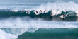 © Ryan Shepherd/Austockphoto - Group of surfers on a wave