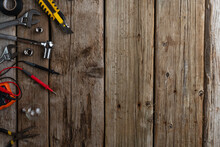 Tools For Work, Screwdriver Wrenches For Nuts, Knife On A Wooden Background Top View