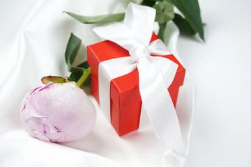 Pink flower and red gift box on white background. Valentine day, Birthday, Woman or Mothers Day.