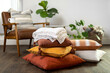 © Cavan Images - Fall Pillows and Blanket Stacked Up