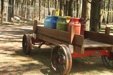 Old Farm Equipment, SEVERAL MILK CANS, BLUE, RED, GREEN ORANGE
