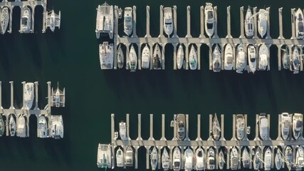 Wall Mural - Drone, aerial shot of luxury boats and yachts docked at Long Beach marina in California