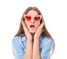 Sticker - Surprised young woman in stylish heart-shaped sunglasses on white background