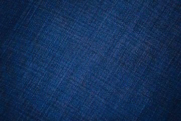 Jeans background. Denim texture. Blue durable cotton backdrop. Abstract navy blue background with copy space for design.