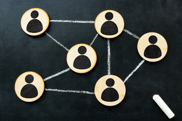 organisation structure and social network concept. connected by lines figurines.