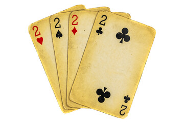 Four old dirty twos poker cards on a white background