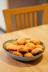 Poster - Selective focus shot of deliciously baked coconut chip cookies on a plate