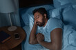 © Syda Productions - people, bedtime and rest concept - indian man sleeping in bed at home at night
