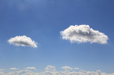 Blue summer sky and big white clouds