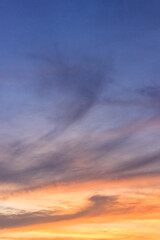 Wall Mural - dusk sky vertical in the evening on twilight with colorful sunlight and cloud fluffy.