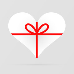 Wall Mural - Gift Heart Icon. White gift box in the shape of a heart tied with red ribbons with a bow. Heart decoration. Love and celebration concept