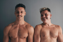 Portrait Of Two Boys With Smiling Moustaches